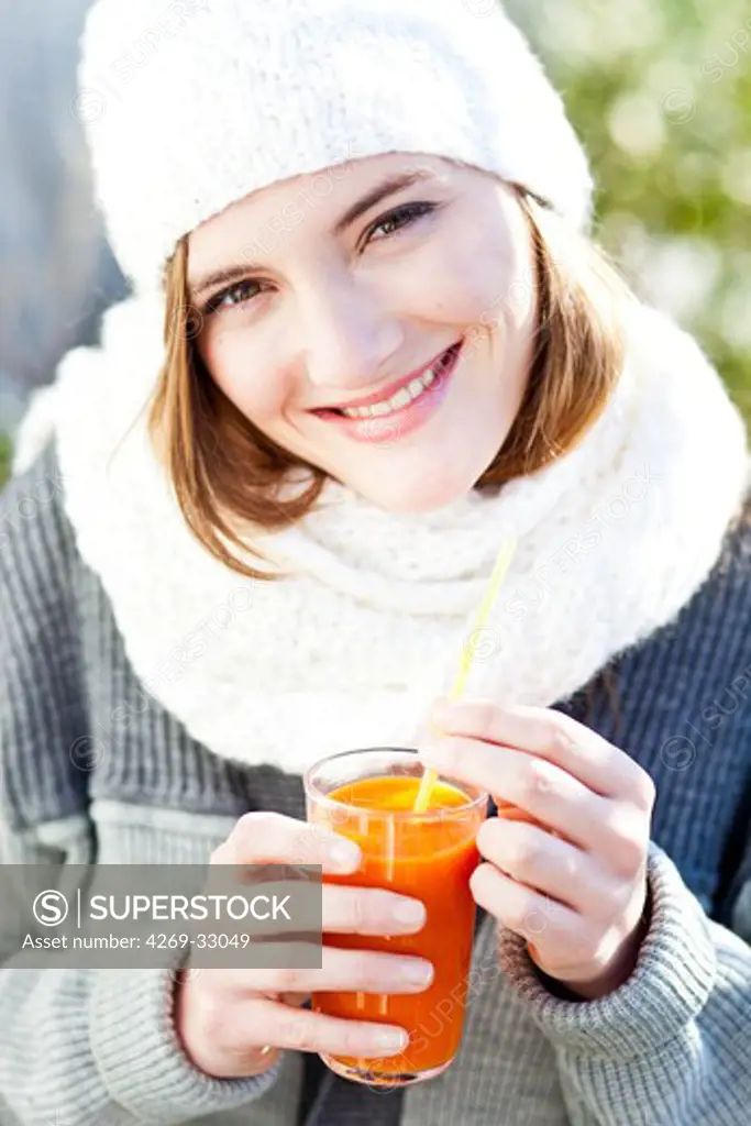 woman drinking fruit juice.