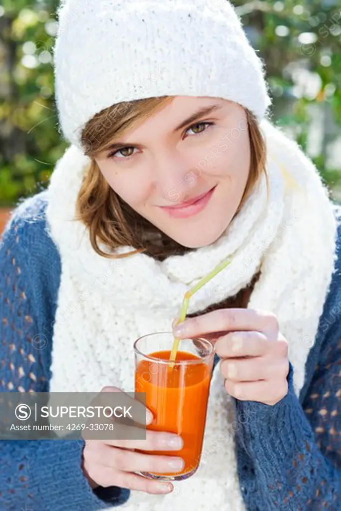 woman drinking fruit juice.