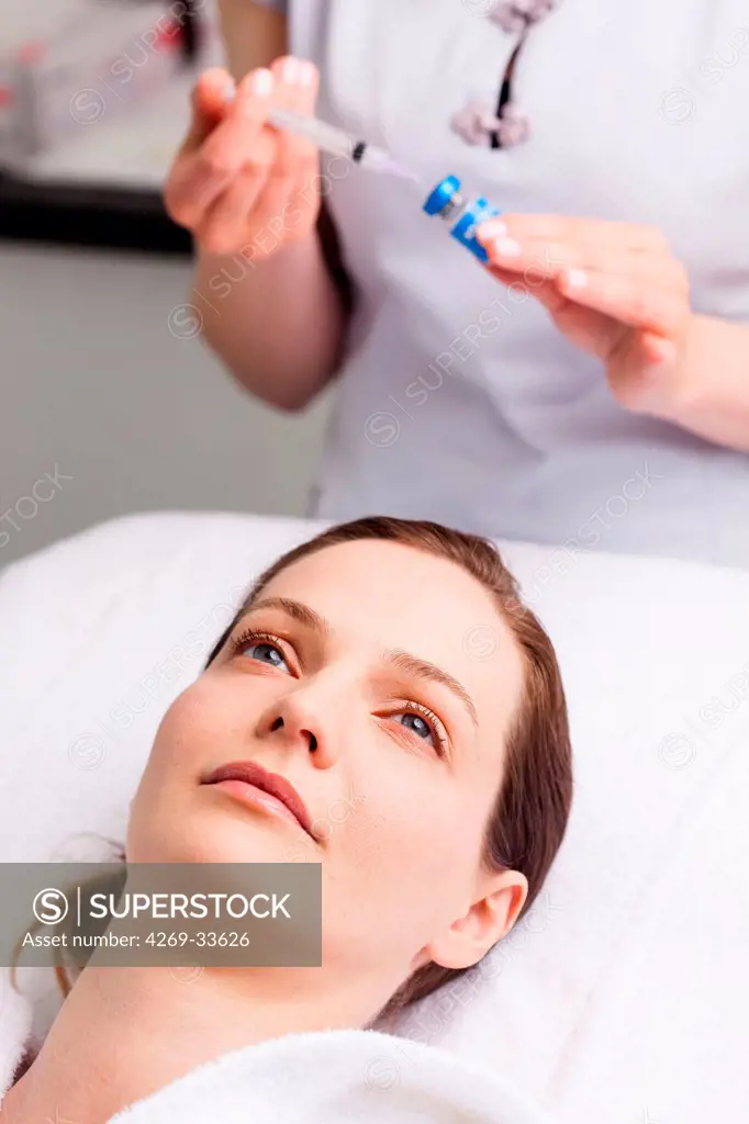 Woman receiving injections for treatment of wrinkles.