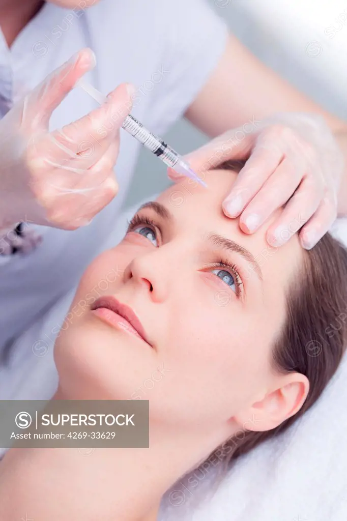 Woman receiving injections for treatment of wrinkles.
