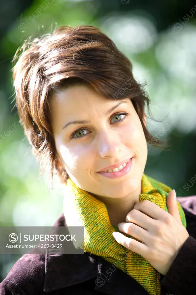Woman in cold weather smiling.