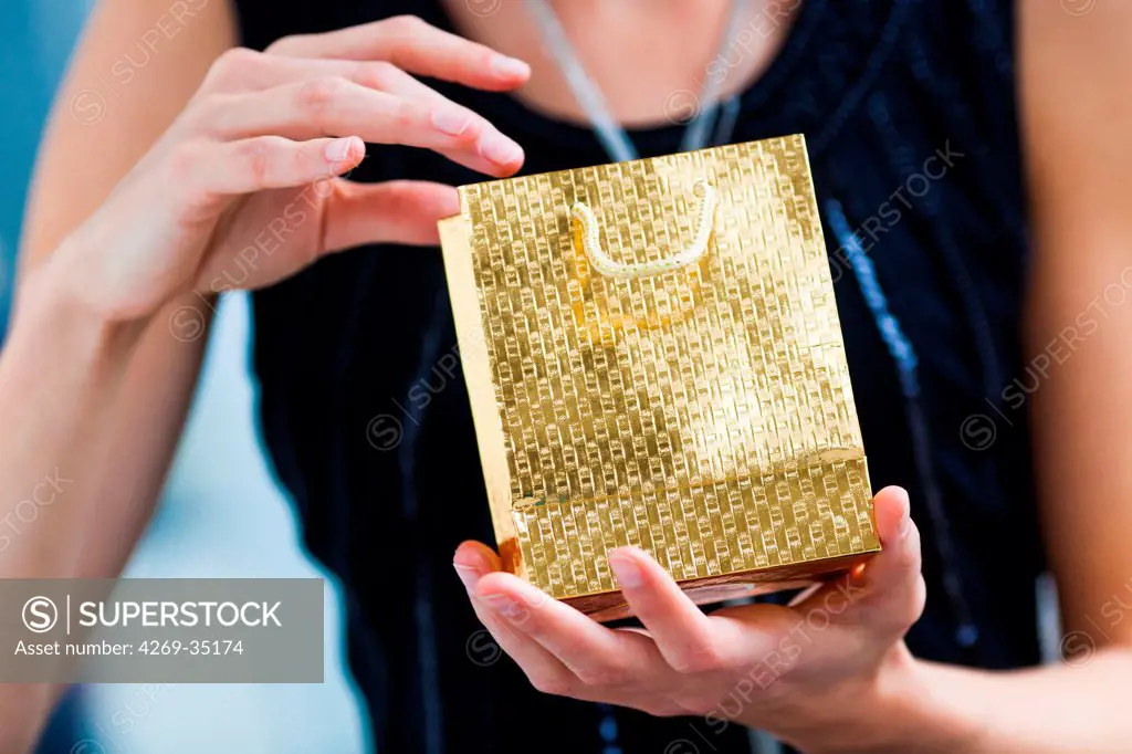 Woman recieving a gift