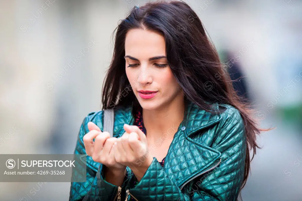 Woman watching her hands