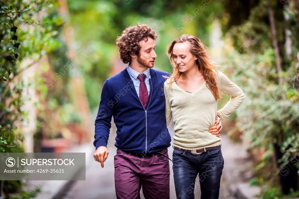 Couple walking in a park