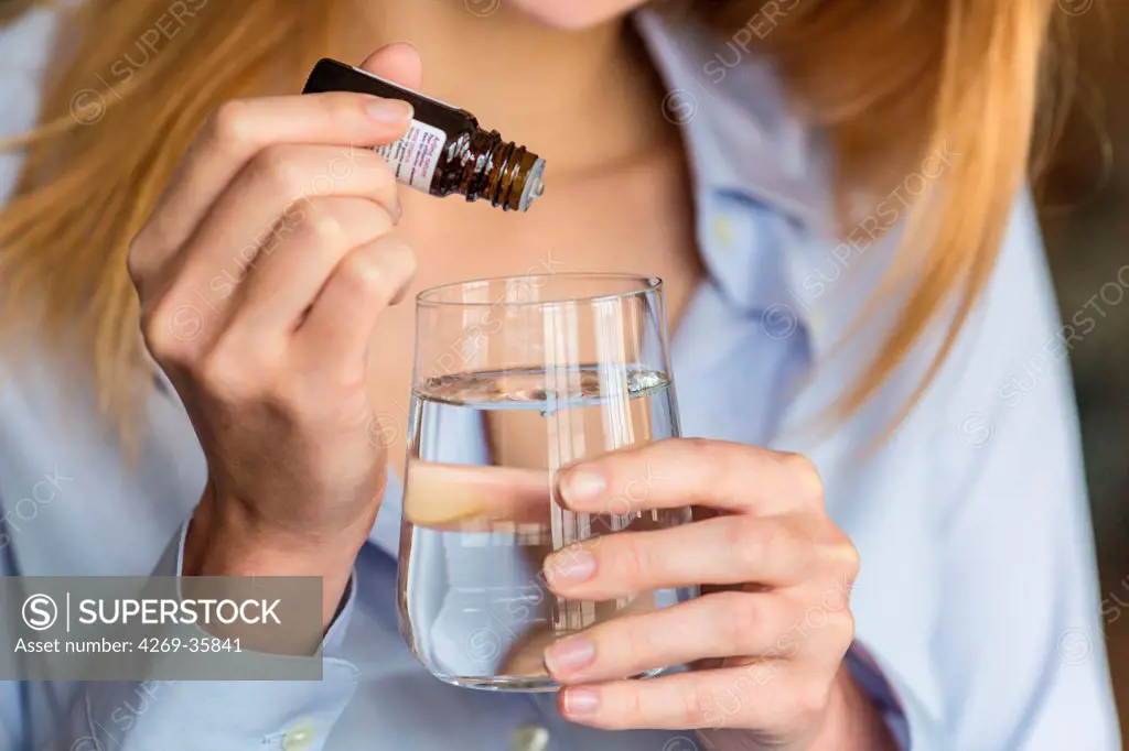 Woman using essential oil