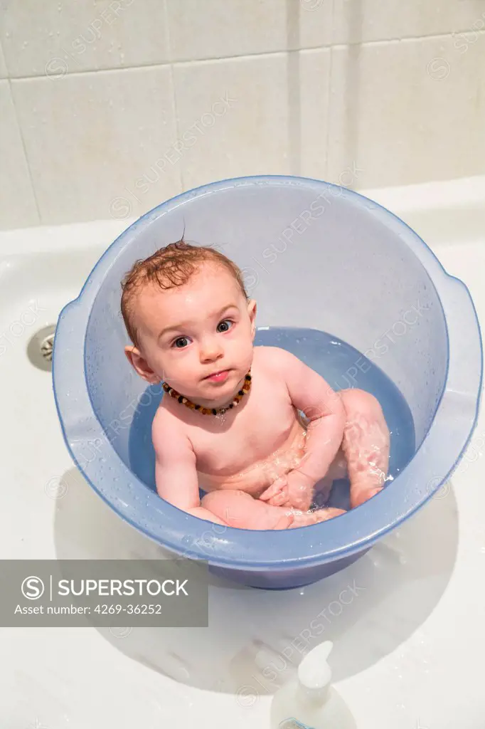 7 old month baby taking a bath