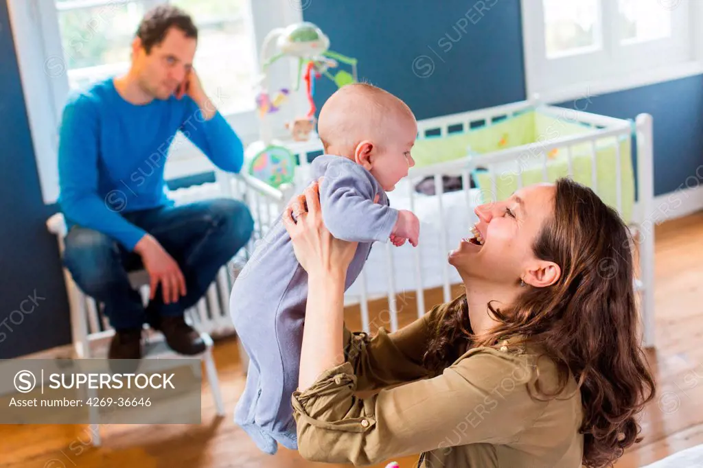Parents with their 5-month-old baby boy
