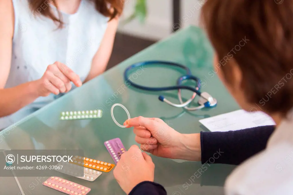 Medical consultation, Doctor discussing contraception with a woman.