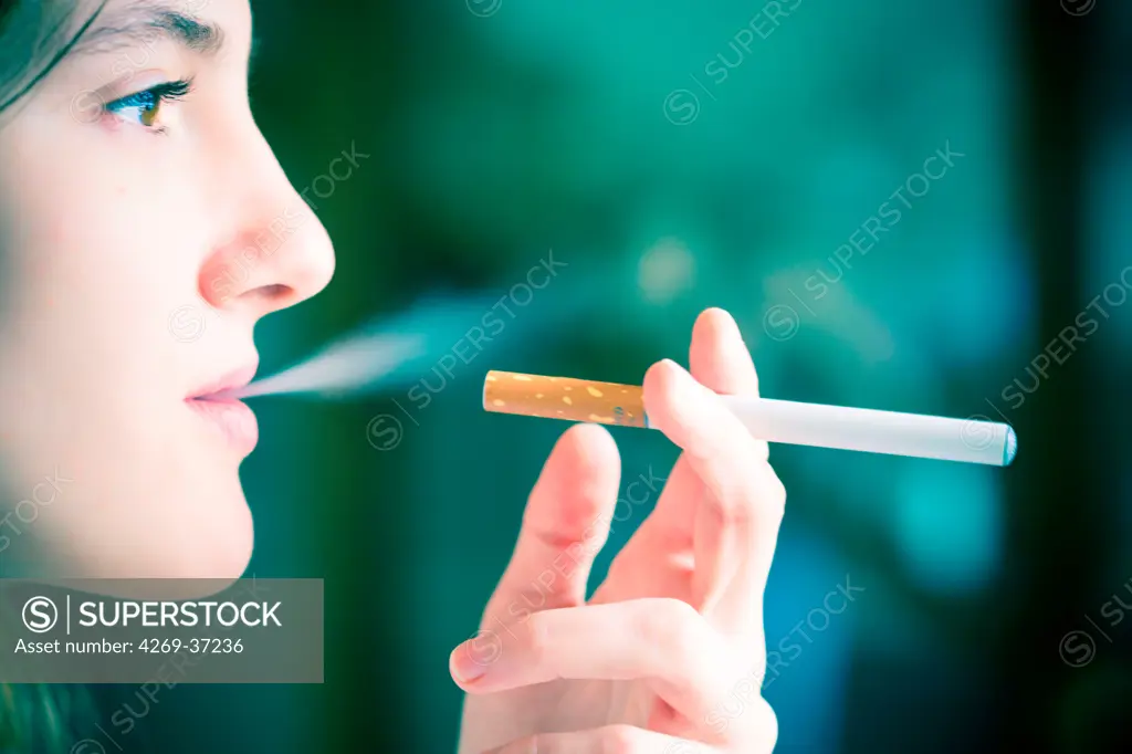 Tobacco control, Woman smoking electronic cigarette.