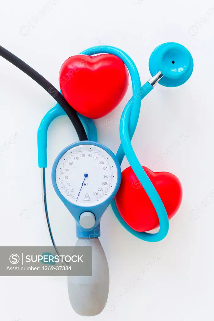 Stethoscope surrounding plastic hearts and tensiometer.