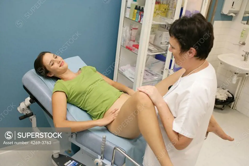 Maternity Department, Angoulème hospital, France. Midwife performing gynecological examination.