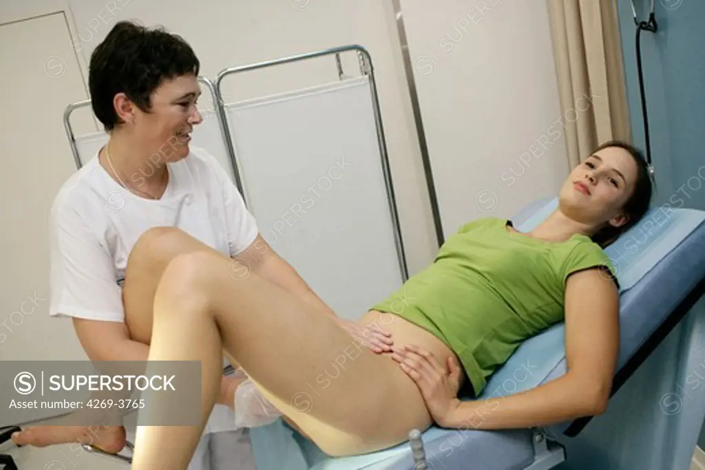 Maternity Department, Angoulème hospital, France. Midwife performing vaginal touch.