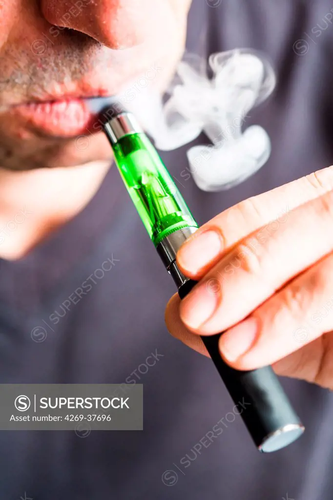Man smoking electronic cigarette.