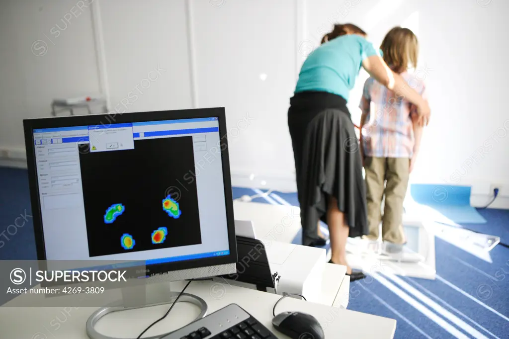 Prodys, a multidiciplinary consultation centre dedicated to dyslexia and Postural Deficiency Syndrome (PDS), Paris, France. Here, examination of the postural balance of a 6 years old boy with a podal sensor.