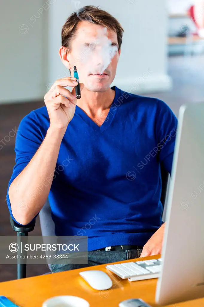 Man smoking electronic cigarette.