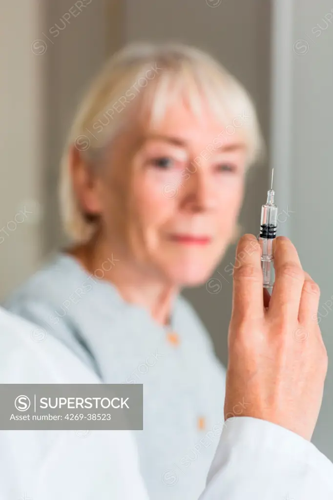 Woman receiving vaccination.