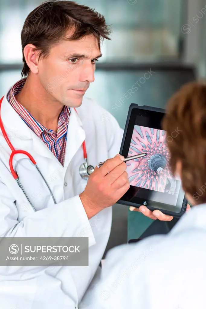 Doctor using a tablet PC.