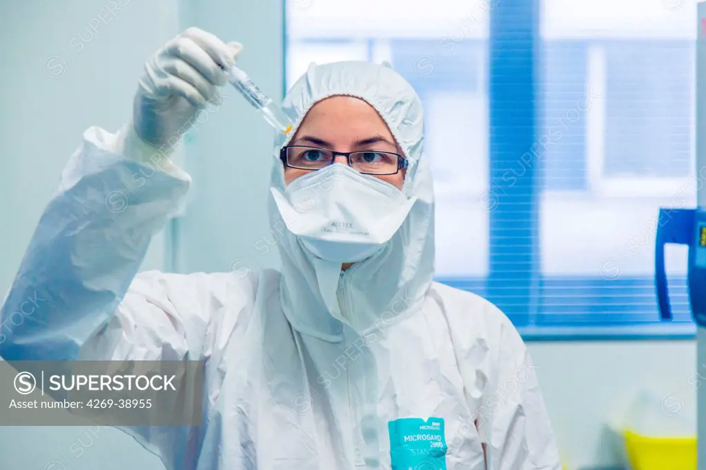 Researcher holding a test tube containing hepatitis virus in a high security laboratory of the Centre de Référence National des Hépatites virales, Henri Mondor Hospital, Creteil, France.