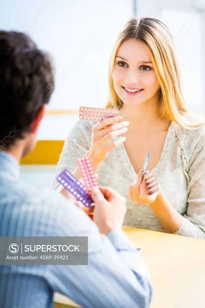 Doctor discussing oral contraception with a woman.