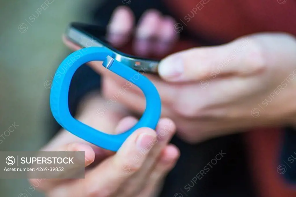 UP® by Jawbone electronic wristband, sensor tracker connected to a smartphone.