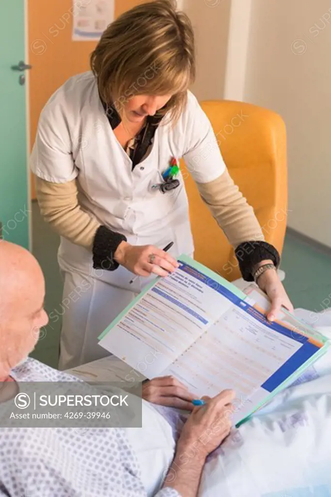Social worker and patient with cancer, Angoulême hospital, France,