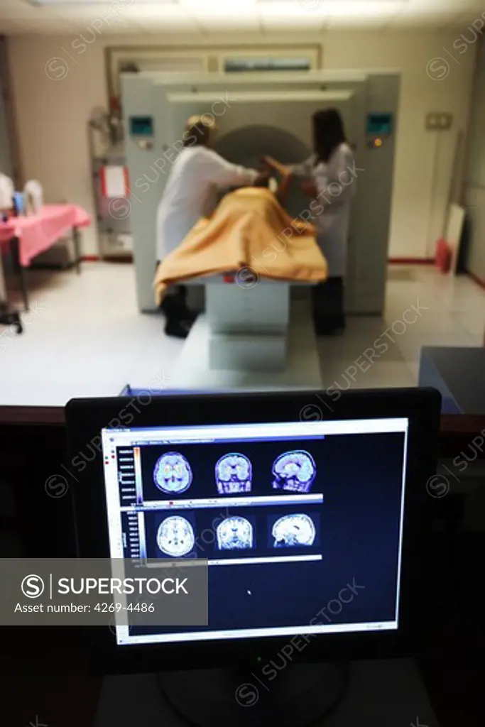 Patient undergoing Positrons Emission Tomography scan (PET scan) of the brain.