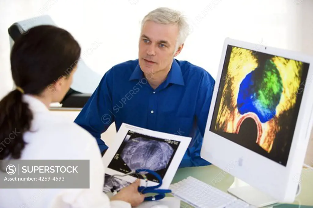 Doctor discussing prostate ultrasound scan with a patient.