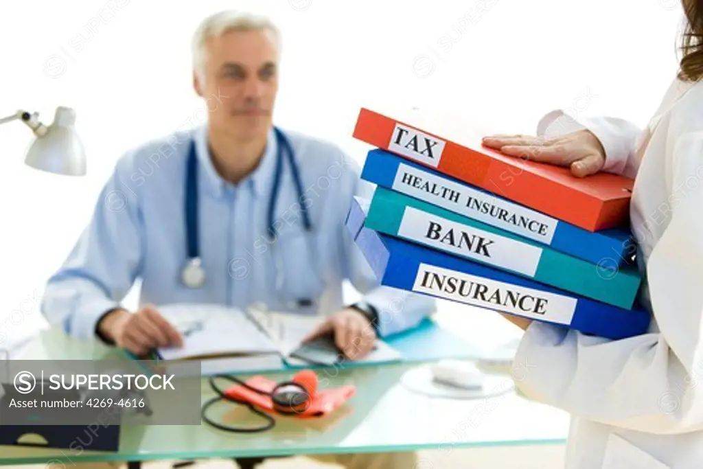 General practitioner dealing with administration and paperwork.