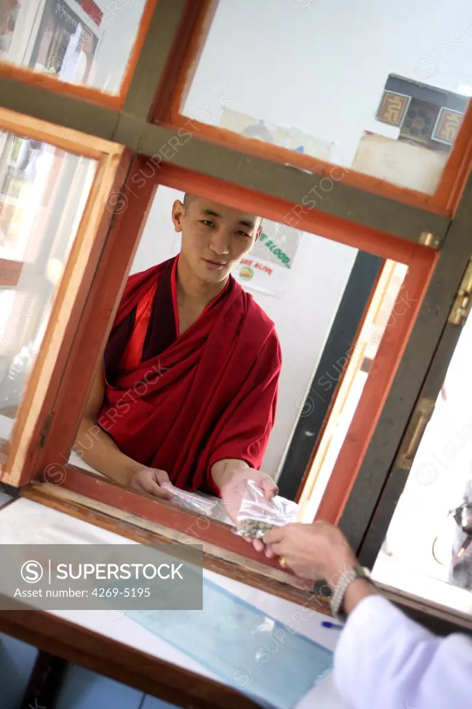 Department of traditional medicine, Thimphu hospital, Bhutan. A patient is given traditional medicine, mainly made of medicinal plants, at the hospital pharmacy.