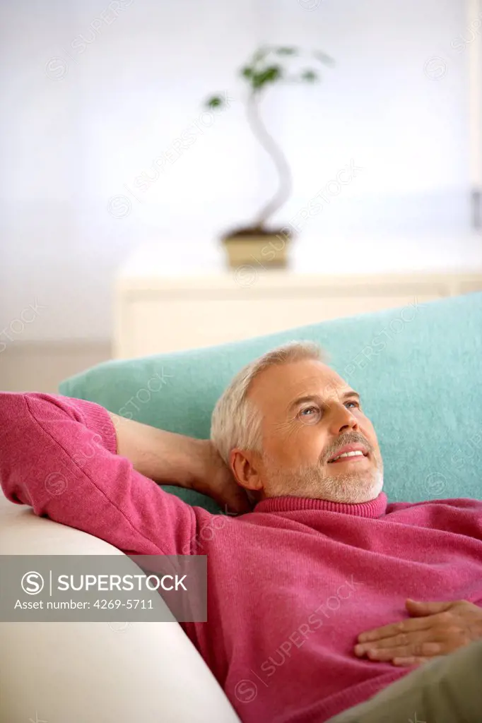 Middle aged man resting.