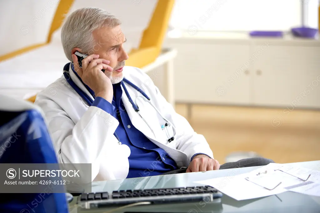 Hospital doctor on the phone.