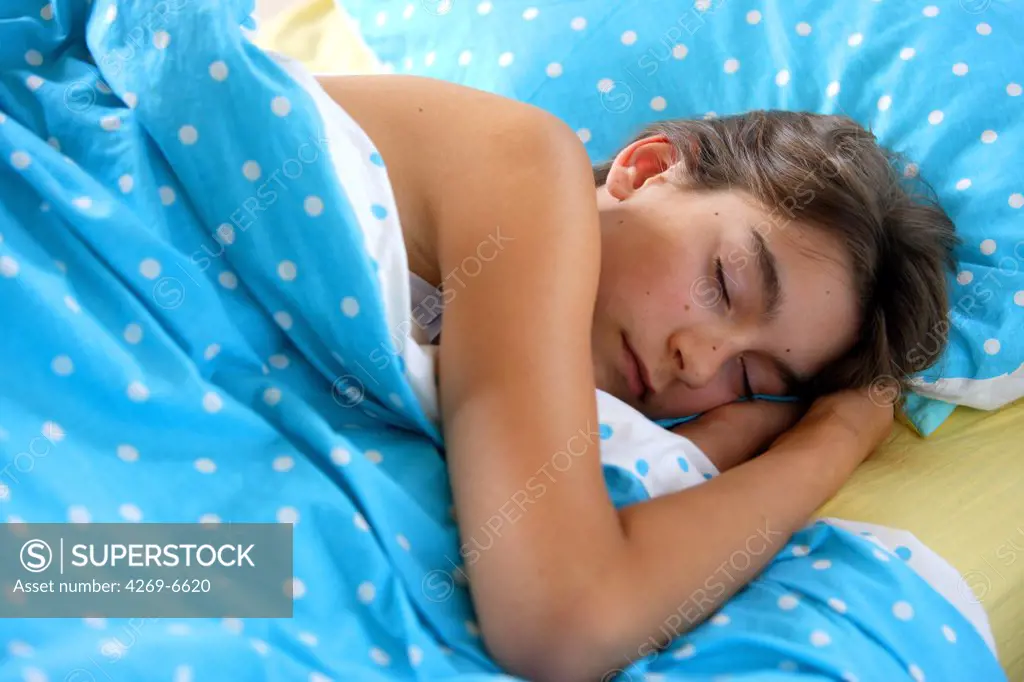 Teenage girl sleeping.