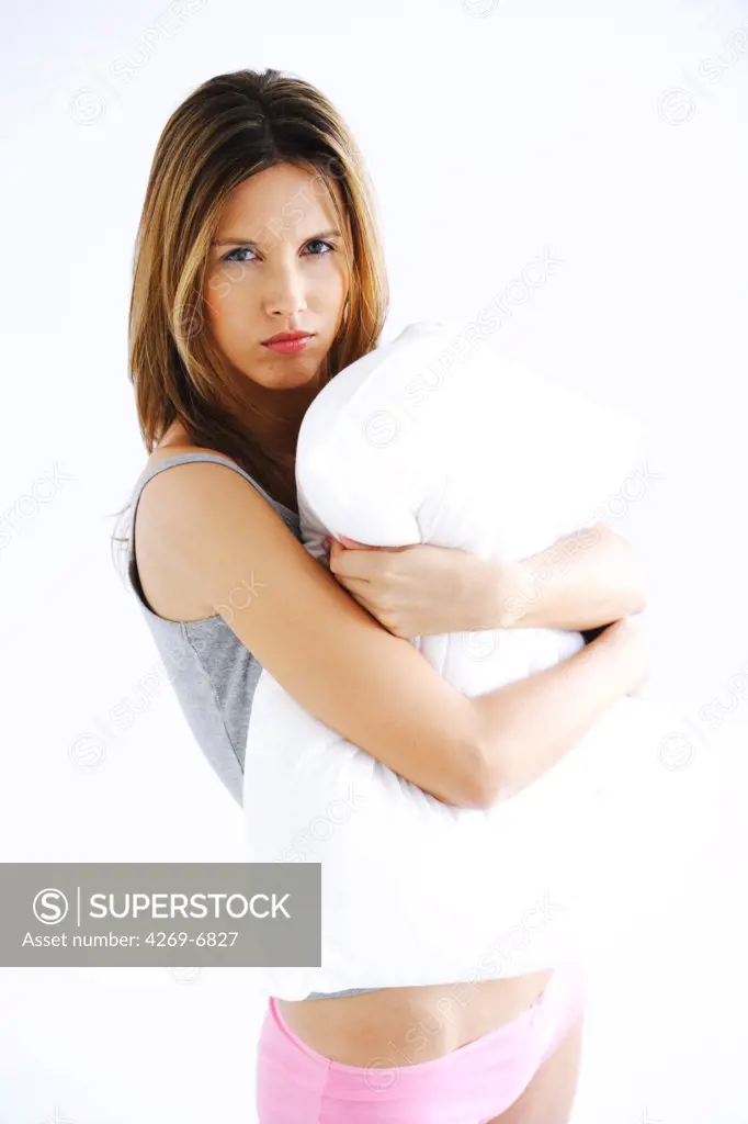 Woman with pillow.