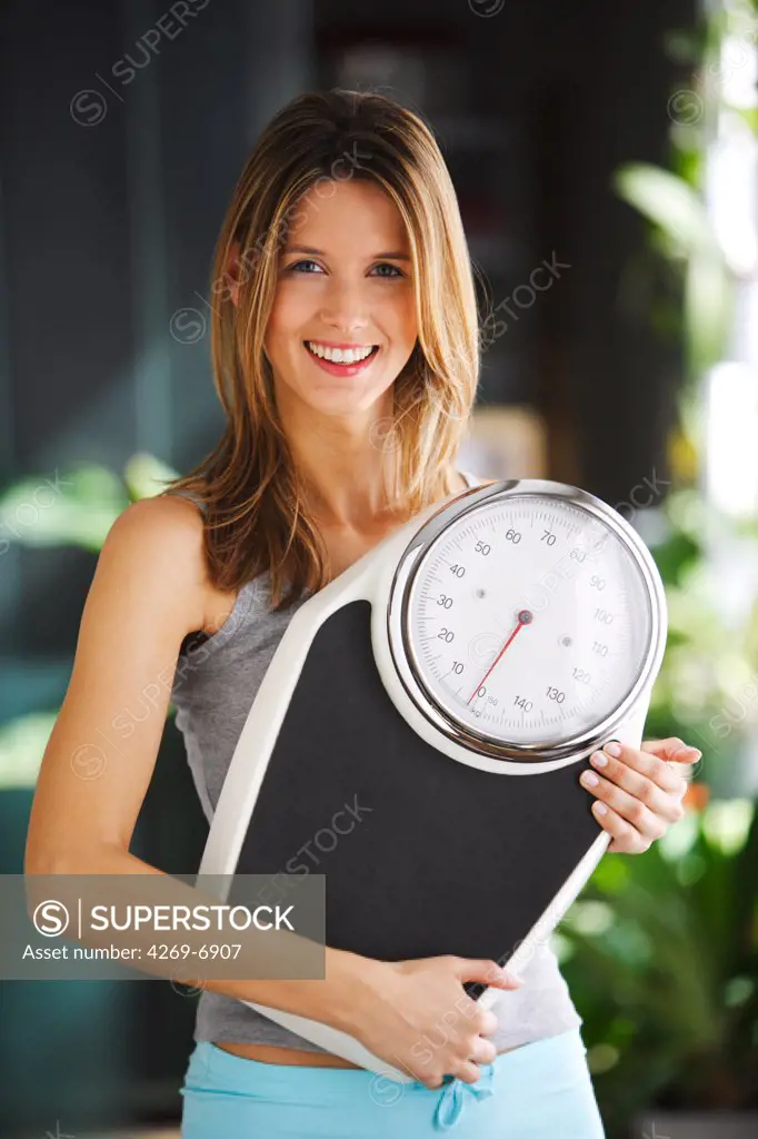Woman with a scale.