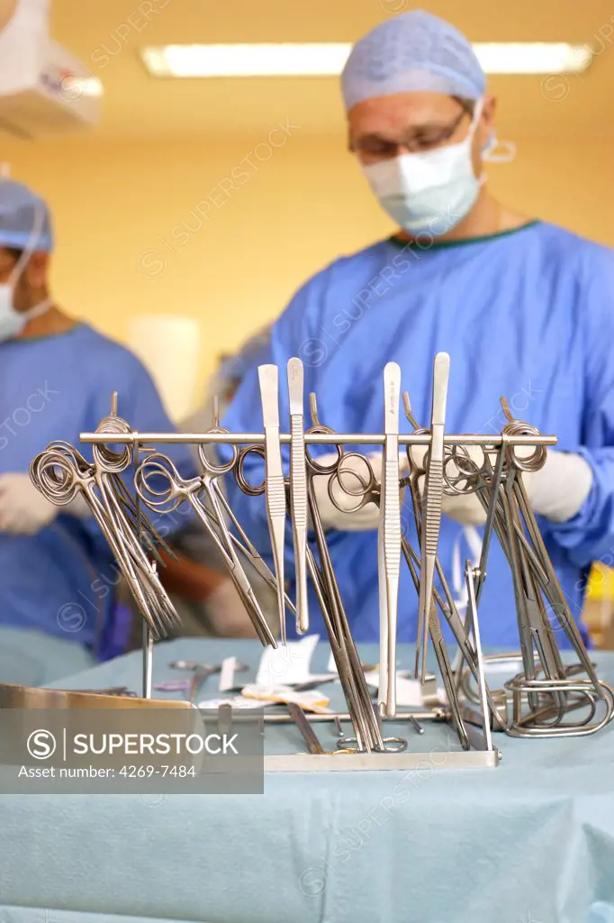 Medical team performing surgery. Department of gastroenterological surgery, Limoges hospital, France.