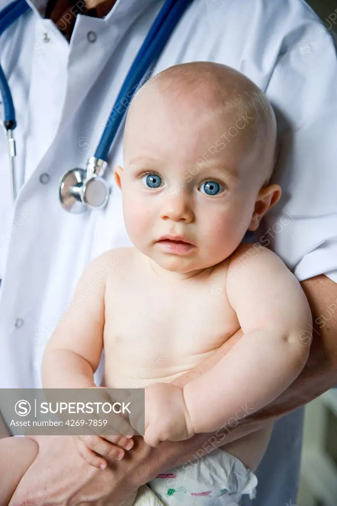 9 months old baby in consultation with paediatrician.
