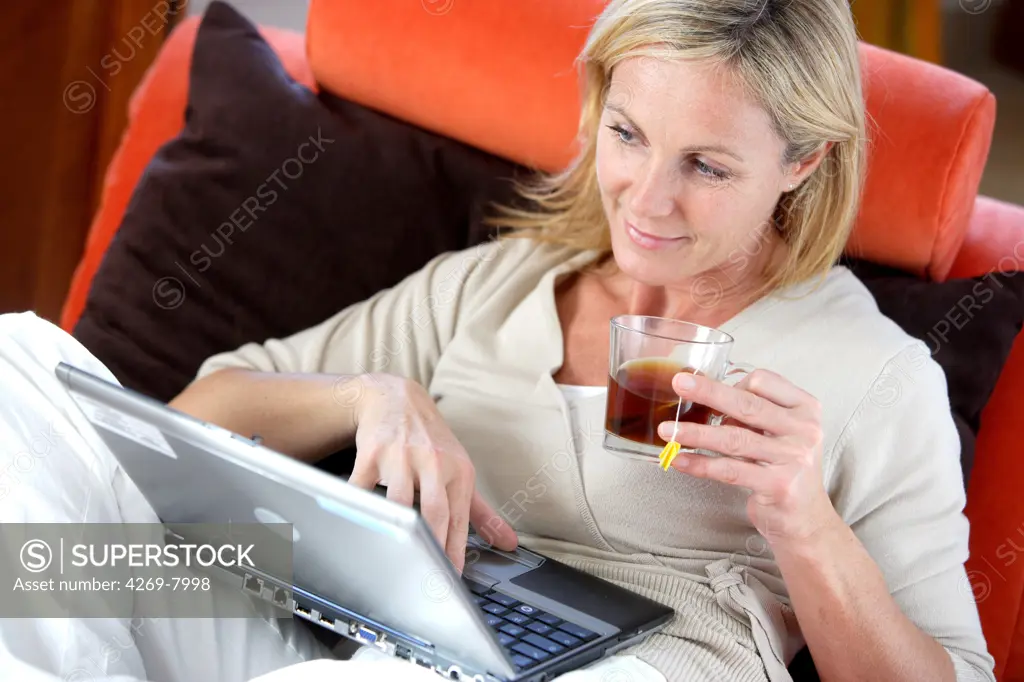 Woman using a laptop computer.
