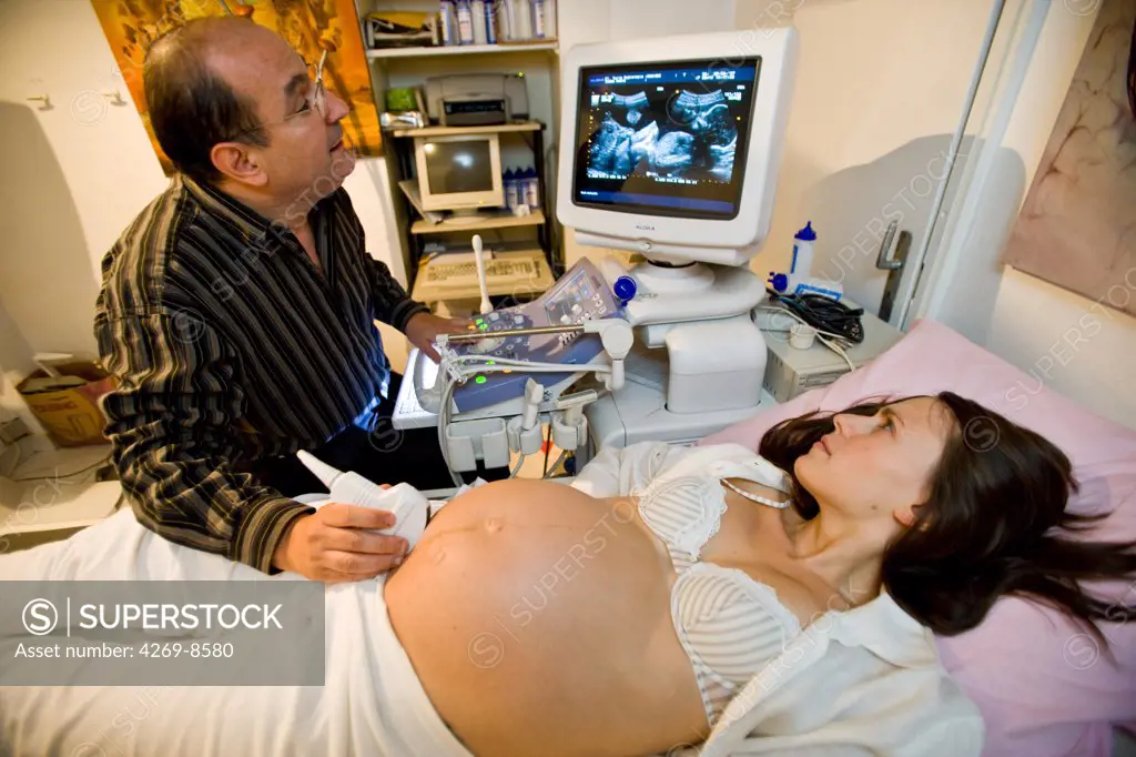 9 months pregnant woman undergoing an obstetrical ultrasound scan.