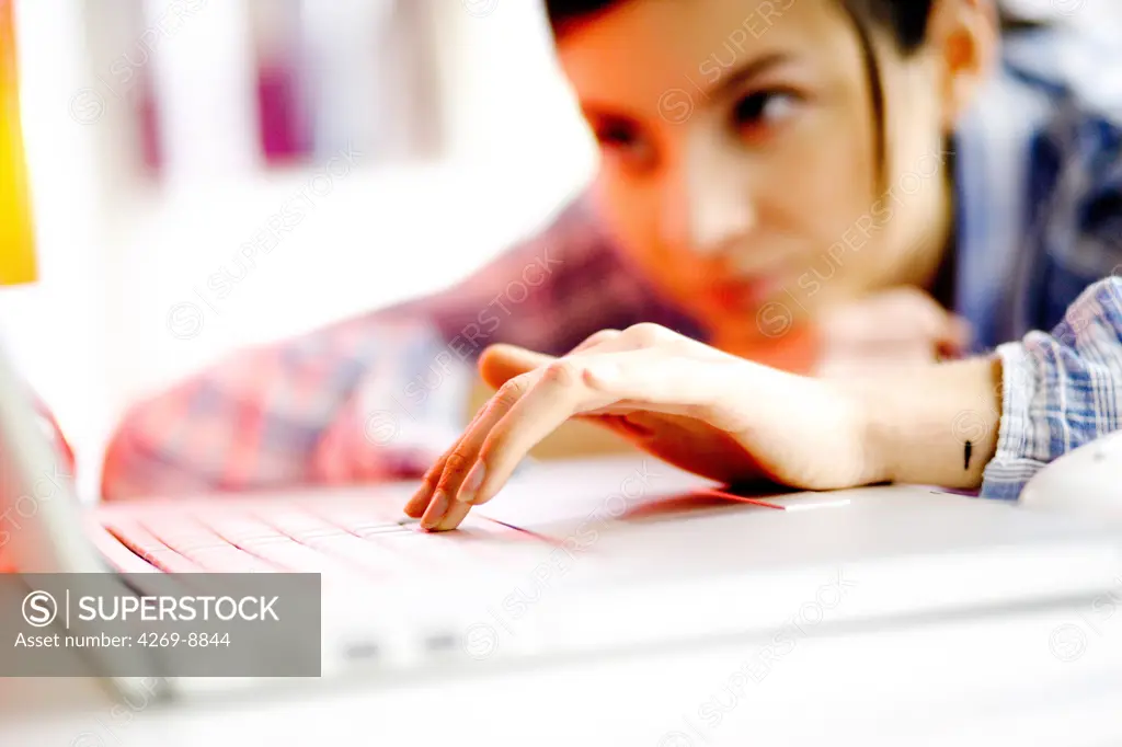 Woman using computer.