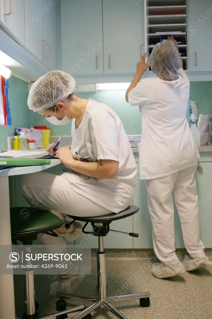 Nurses working in sterile unit. Department of Haematology and Immunology, Limoges hospital, France.