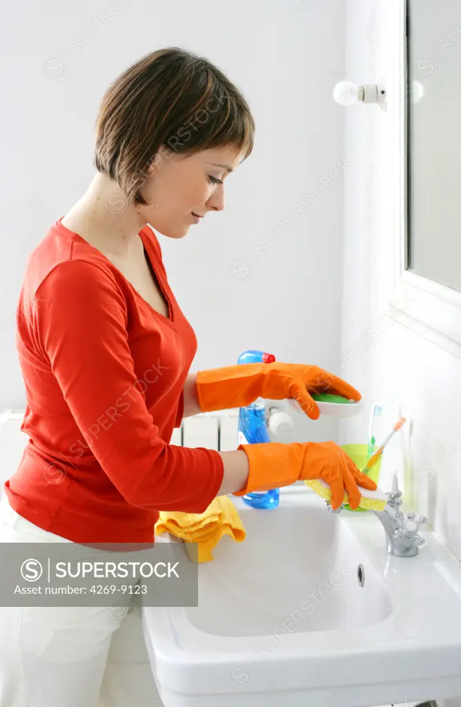 Woman house cleaning.