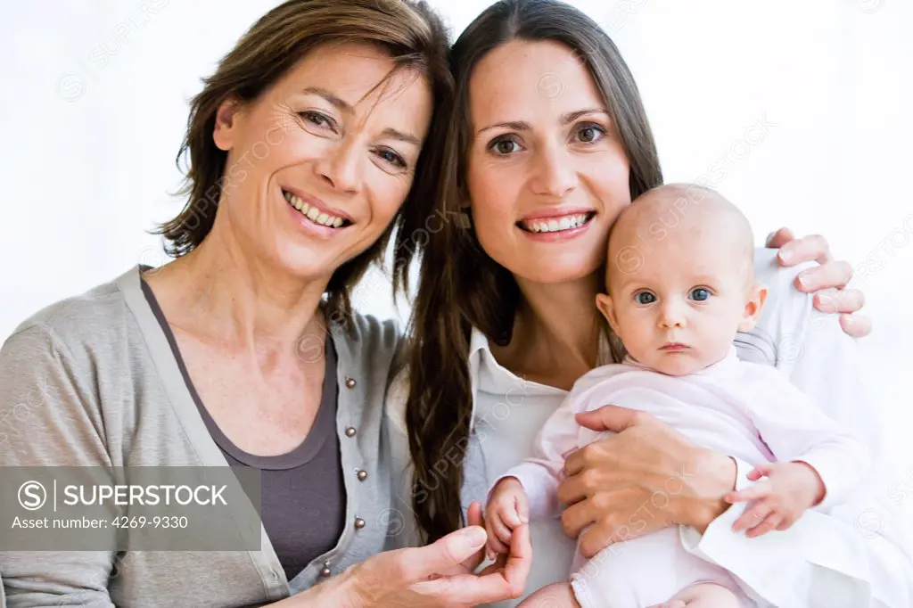 3 months old baby with mother and grandmother.