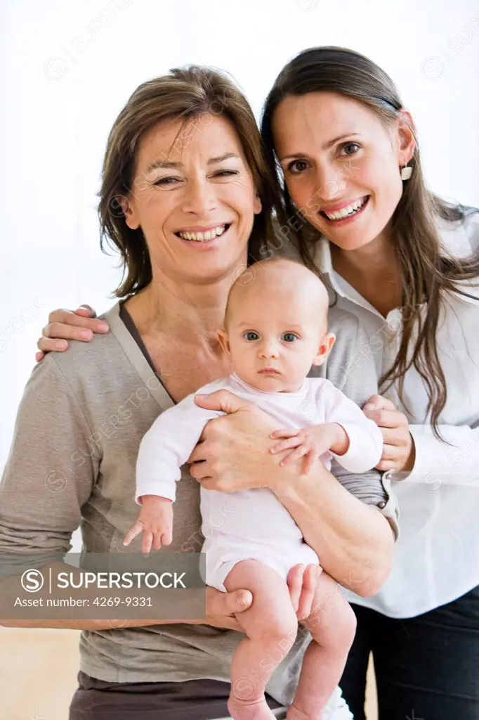 3 months old baby with mother and grandmother.
