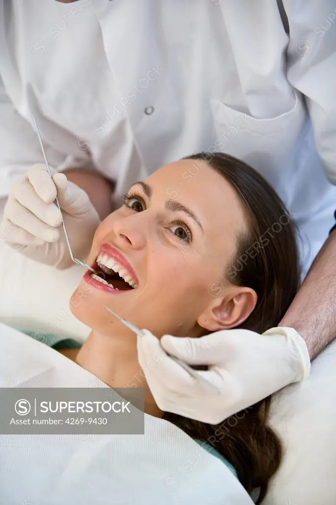 Woman getting dental examination at the dentist.