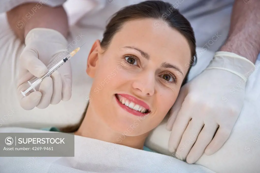 Woman receiving Botox injections for treatment of wrinkles.