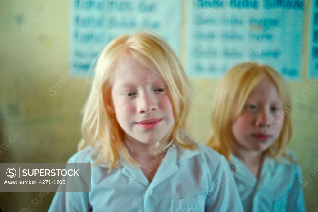 Panama, Kuna Yala, Guna Indigenous albino students at Spanish-Guna bilingual school in Ustupu
