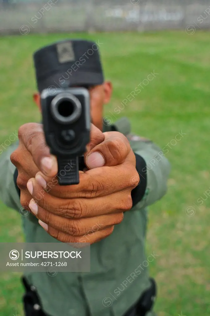 Uniformed police officer at a tactical and firearms training course at the Panamanian National Police force academy. Panama