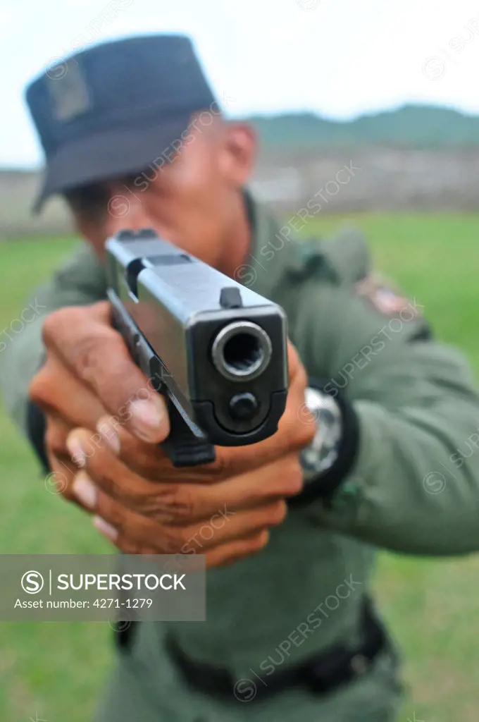 Uniformed police officer at a tactical and firearms training course at the Panamanian National Police force academy. Panama