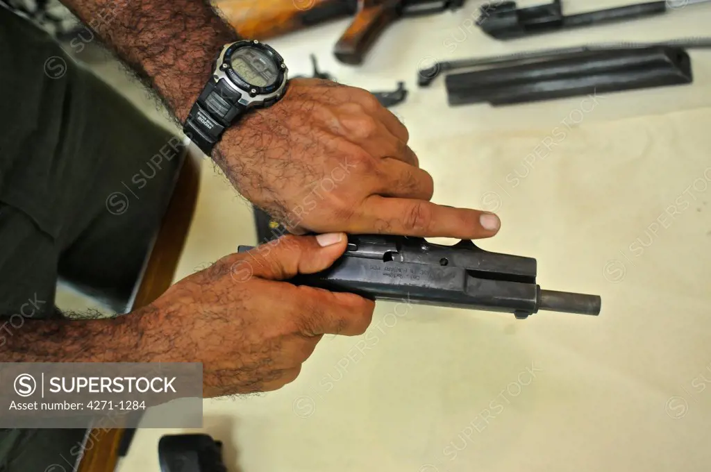 Uniformed police officer at a weapon and firearms training course at the Panamanian National Police force academy, Panama