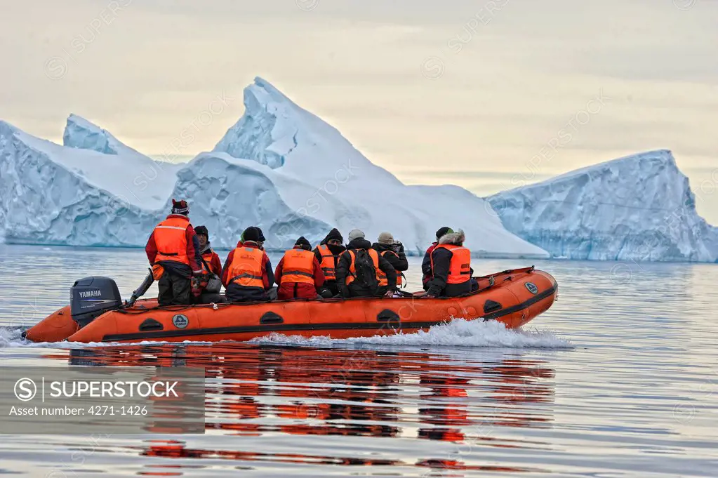 Antarctica, Wandel island (Booth island) Tourists explore Antarctica on a zodiac